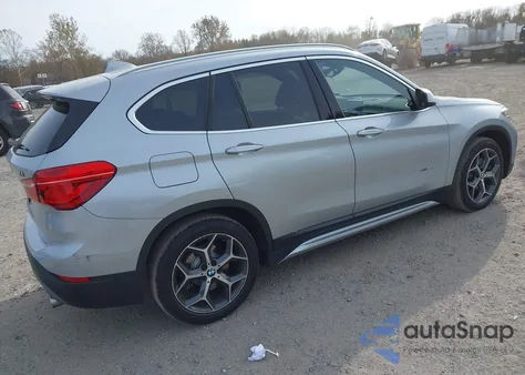 2018 BMW X1 xDrive28I z USA, uszkodzony, nr VIN WBXHT3C37J5K28912